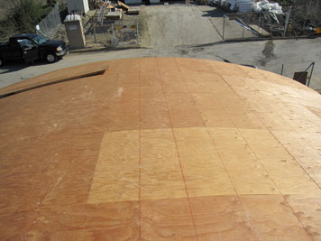 the curved roof of the garage